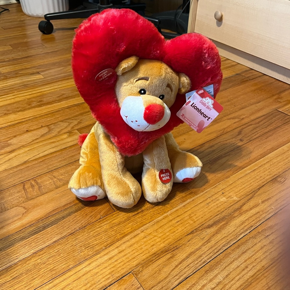 Cuddle Barn Lionheart Plush Lion Toy Red and Tan. Sings “Come & Get Your Love”